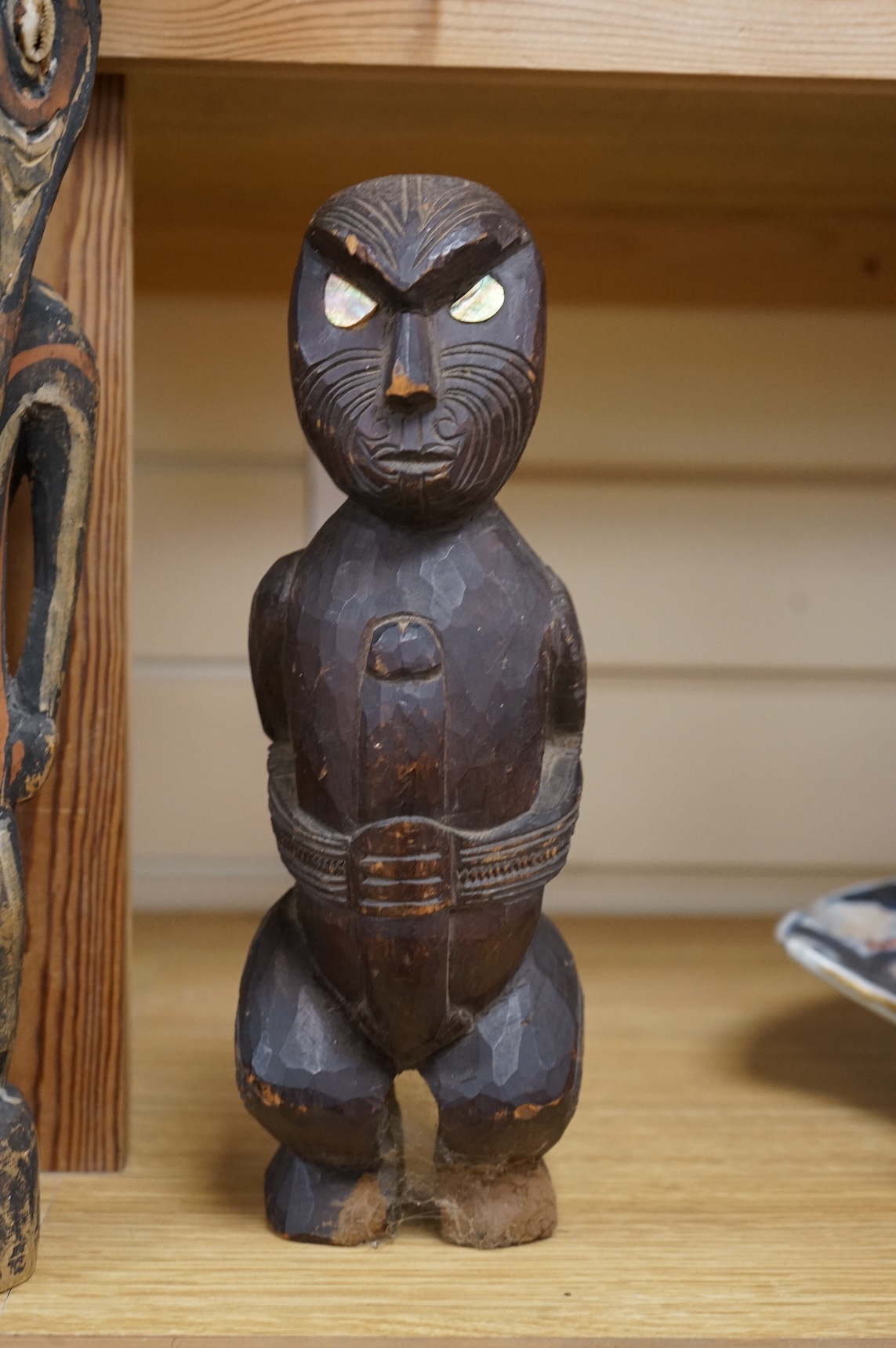 Three wood tribal figures, Africa, South Seas, tallest 37.5cm